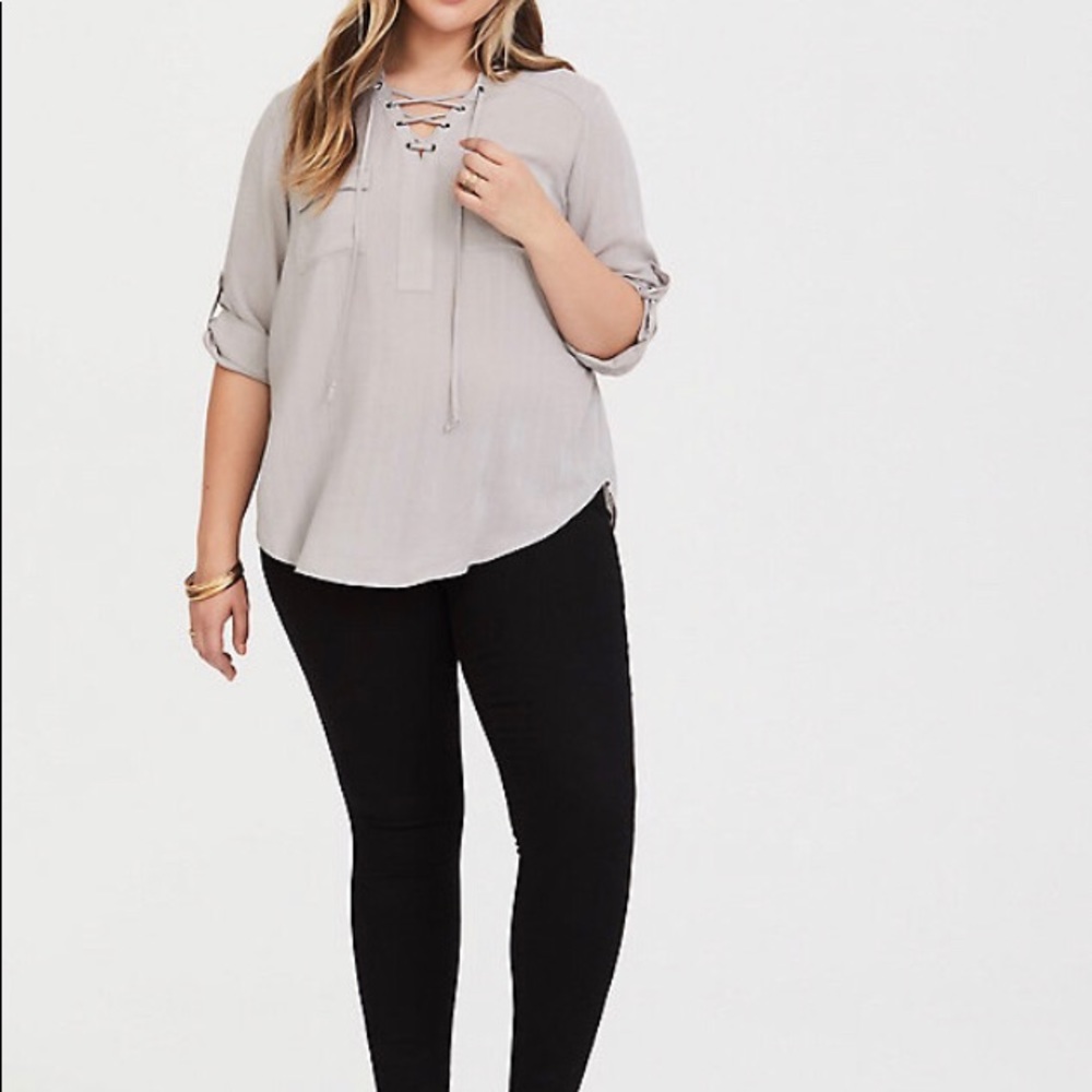 Torrid lace-up pullover top.
